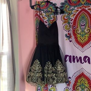 Black and gold fancy prom dress.